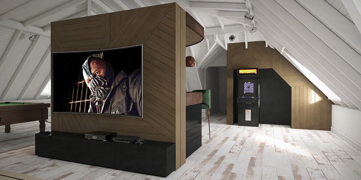 En la tercera planta de la casa, con cubierta en mansarda y estructura de madera a la vista, un mueble central es bar con barra de un lado y pantalla de cine del otro. Mesas con paño verde, pool, gran zona de estar y más, para pasar la cuarentena sin extrañar nada... (A+R Arquitectos)